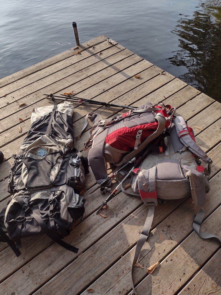 Gear on dock at lake trail