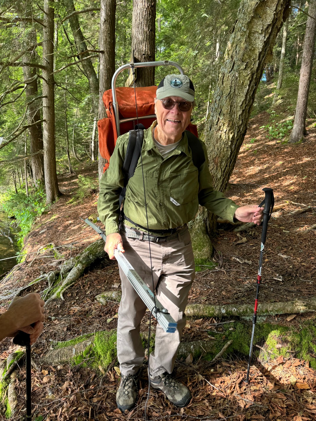 Doug carrying supplies