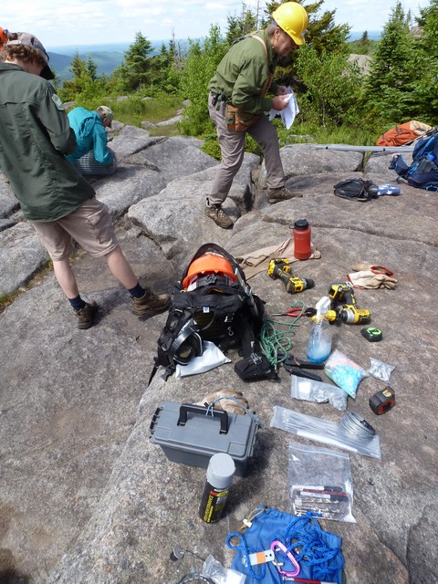 Sam and Doug looking over gear